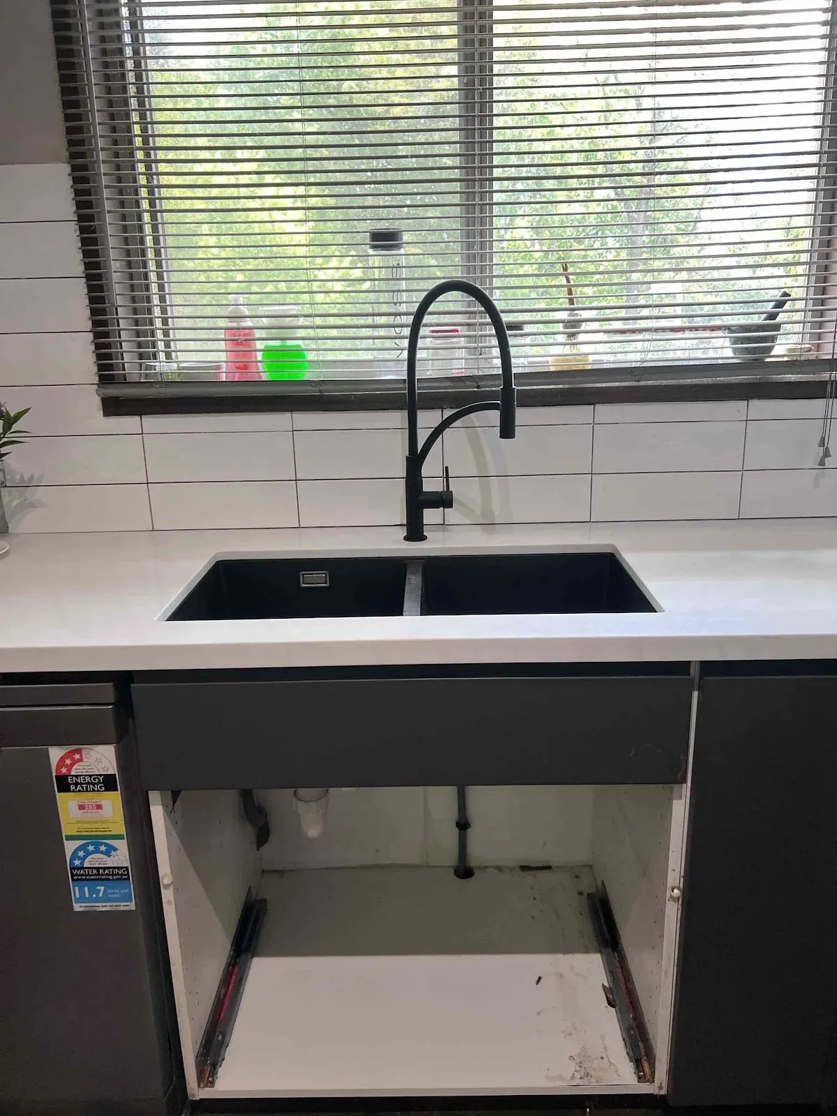Kitchen sink with the new tap connected