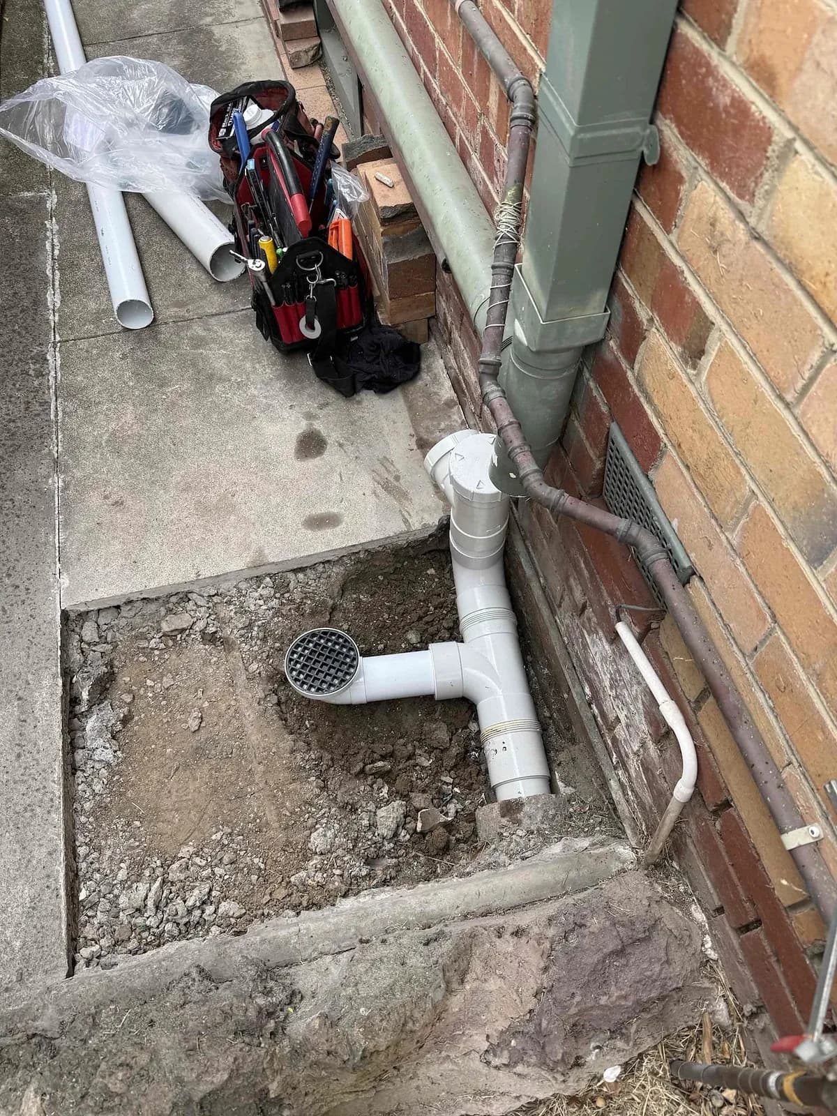 New stormwater junction and downpipe connection
