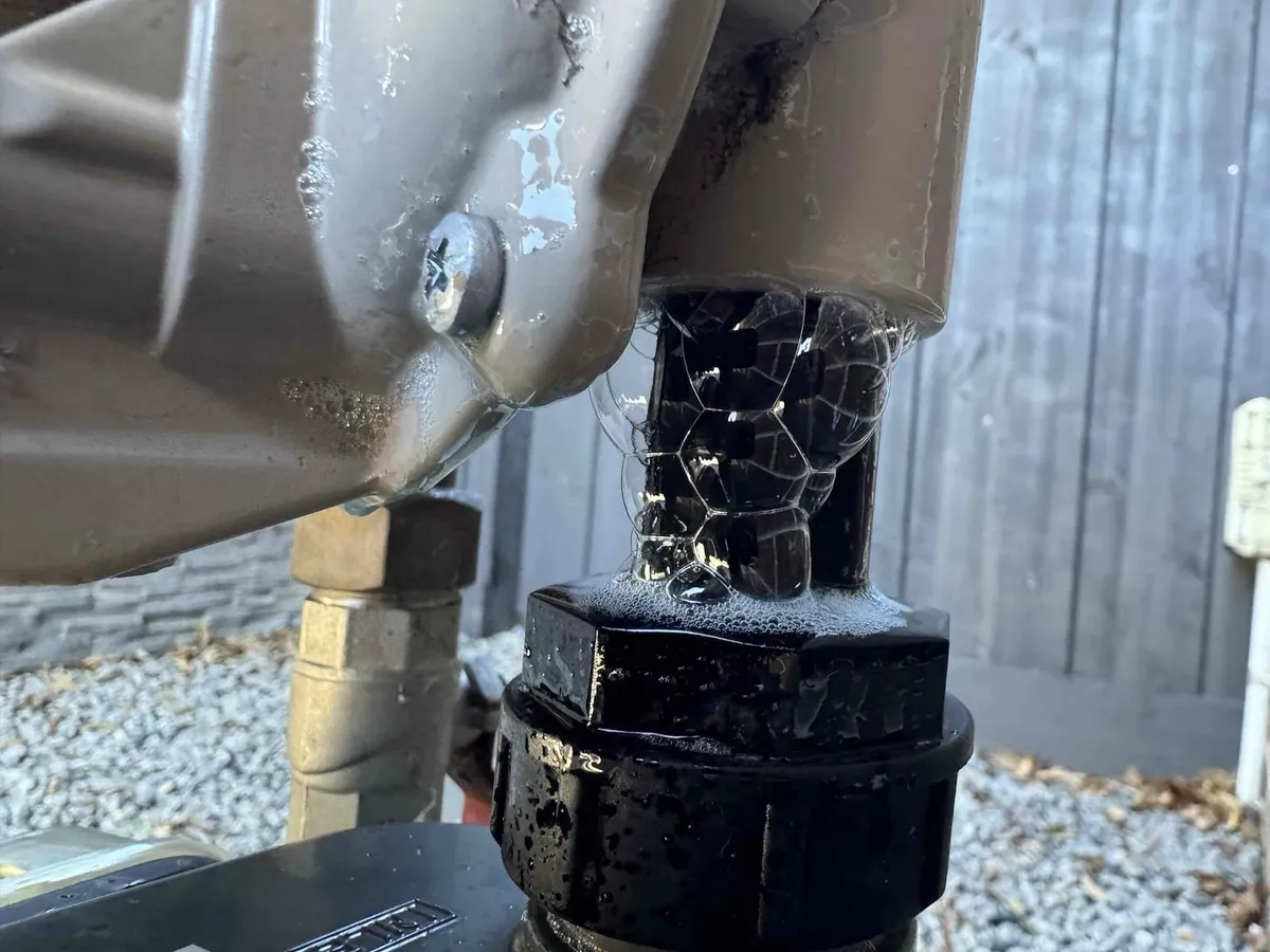 Leak test bubbles on the gas meter fitting