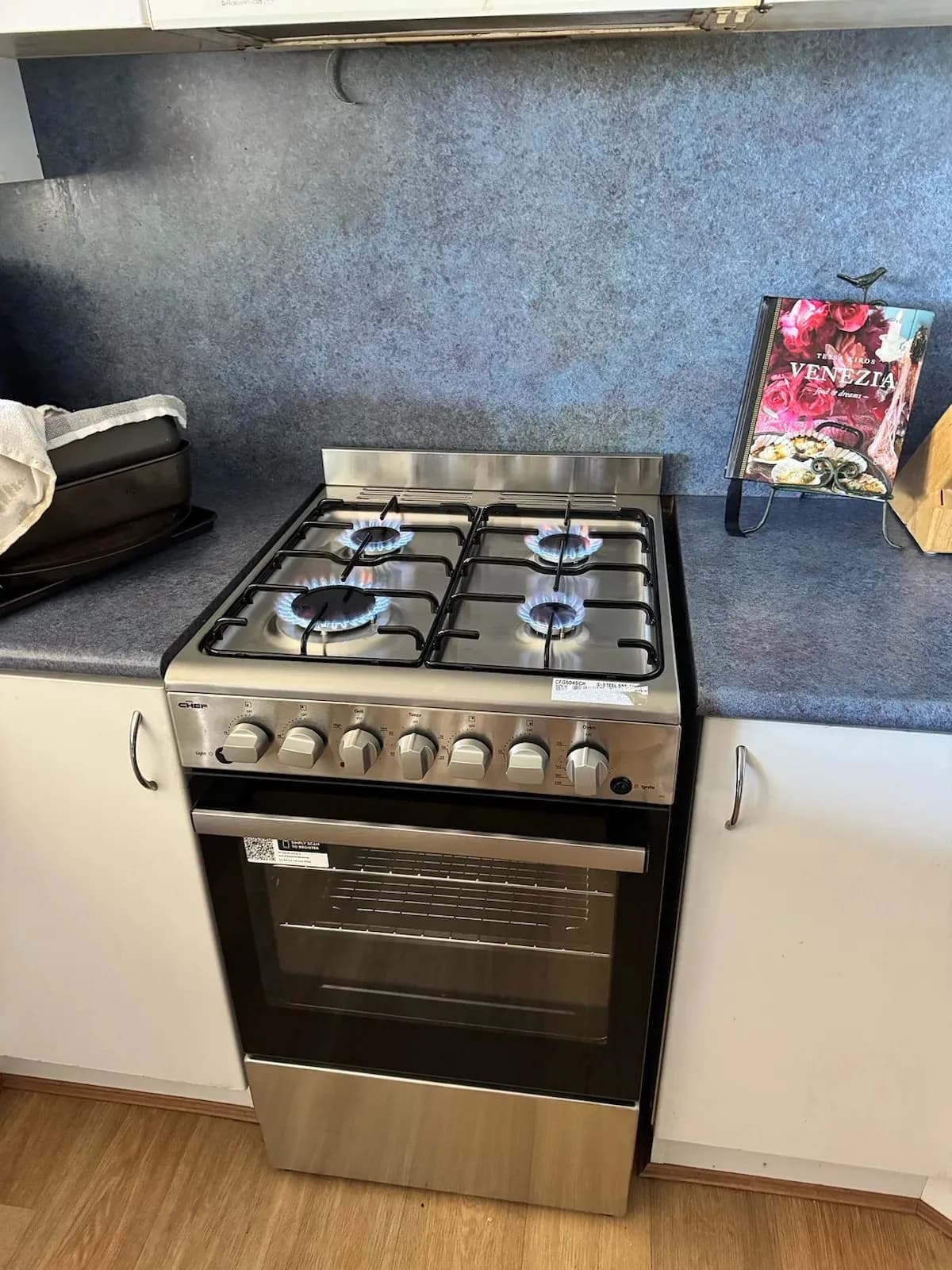 Gas cooktop burners lit after the work