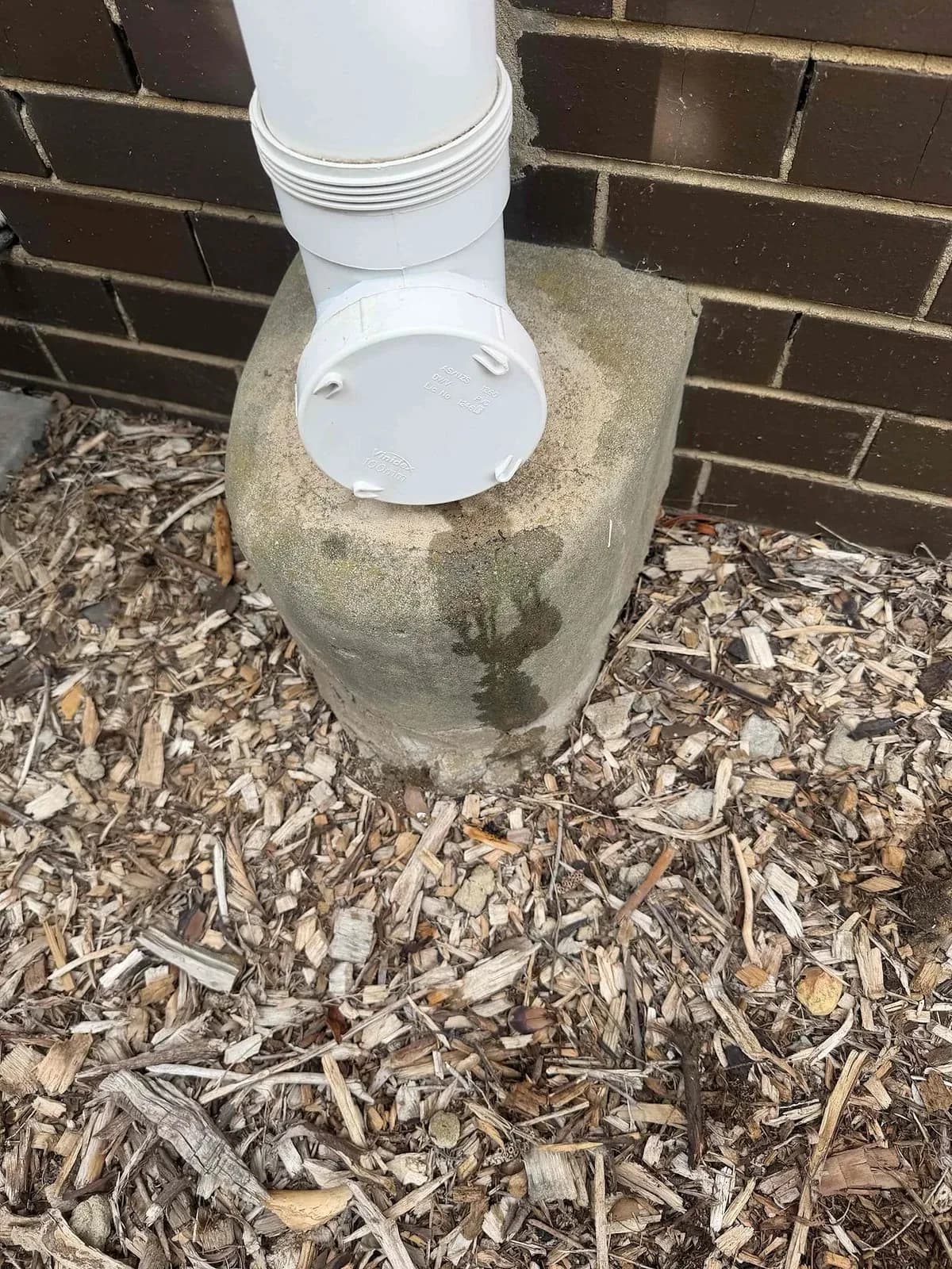 Sewer inspection opening beside the house