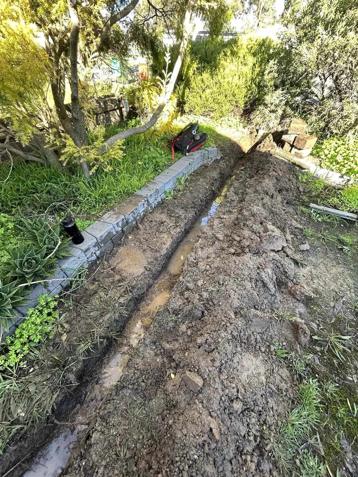 Trench dug from the meter for the new water service
