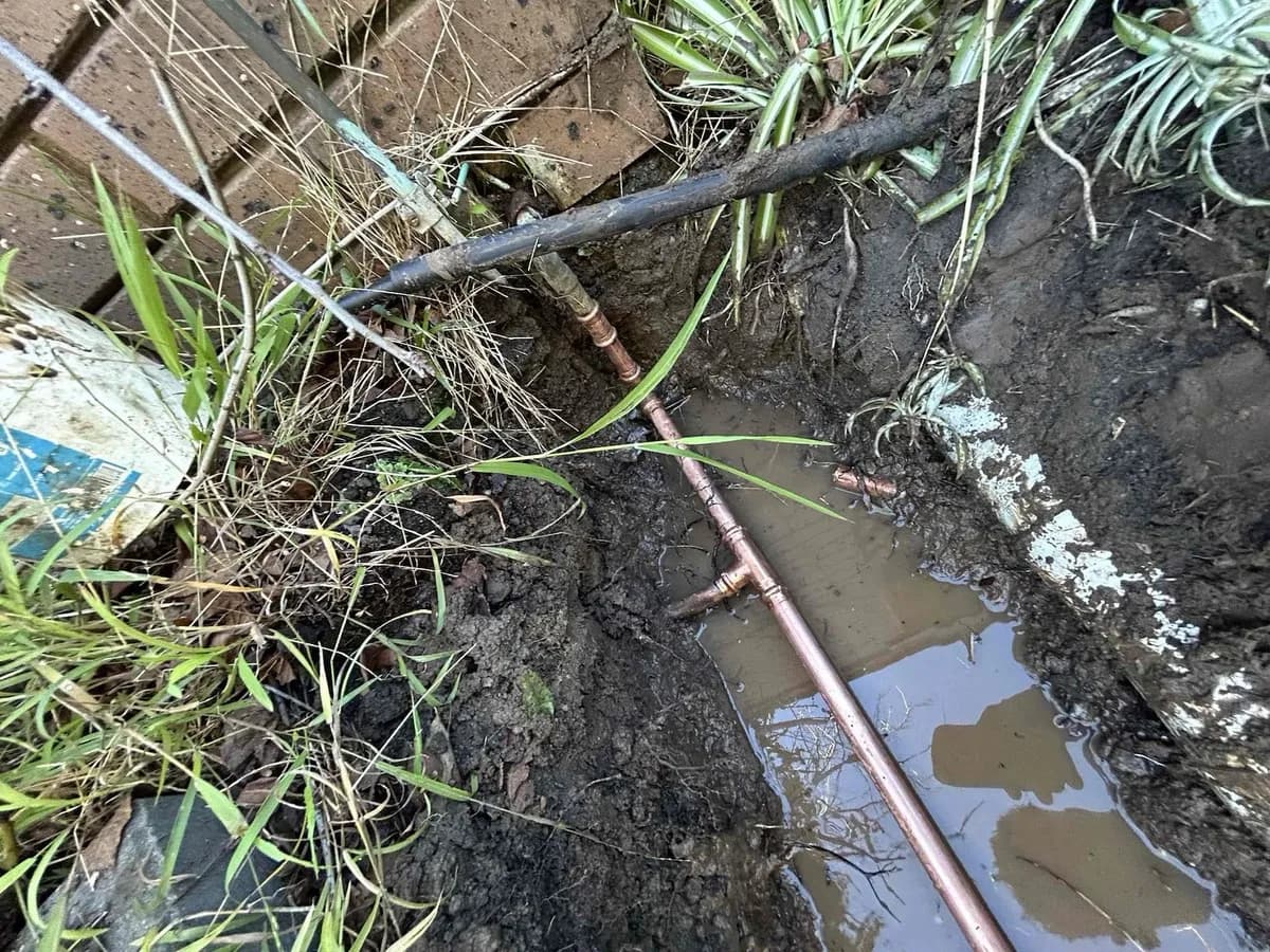 New copper water service pipe laid in the trench