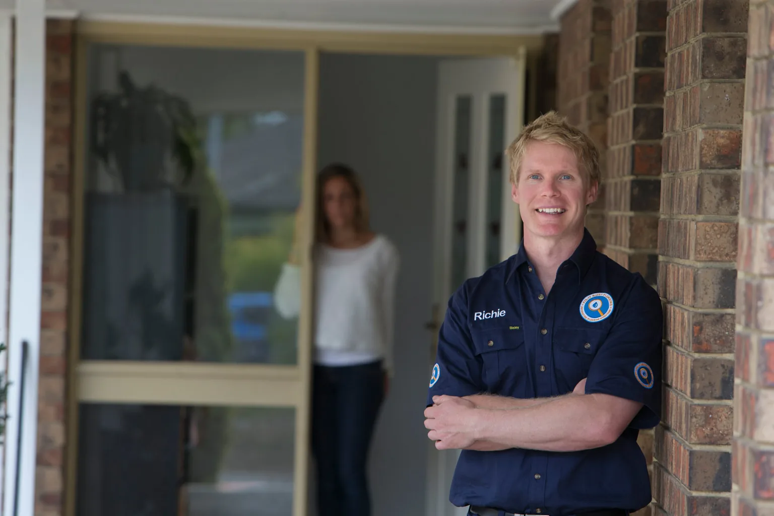 Richie Foster at a customer's front door in Melbourne