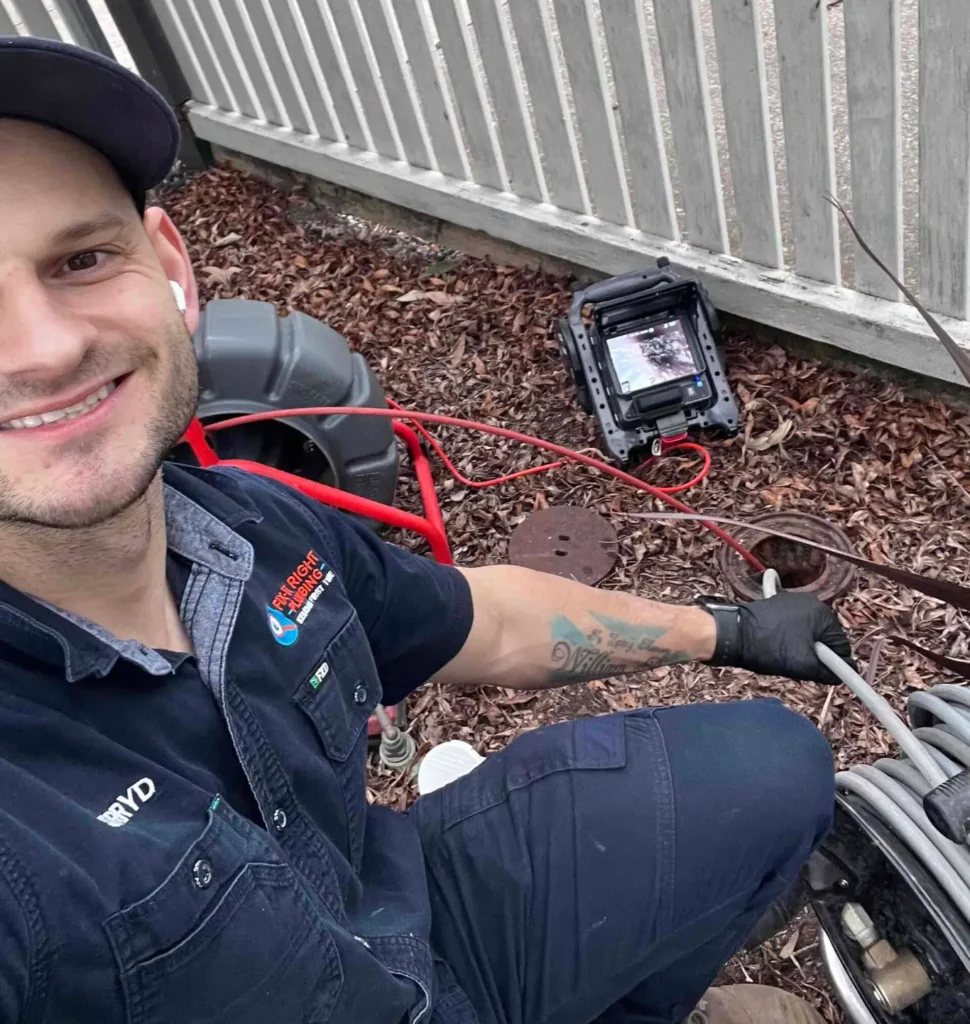 Fix-It Right Plumbing Melbourne plumber working on a blocked drain