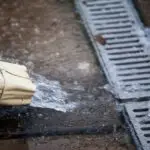 Rain water rushing into a drain