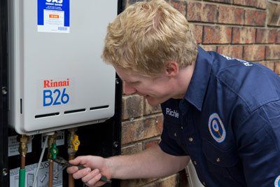 plumber with hot water system